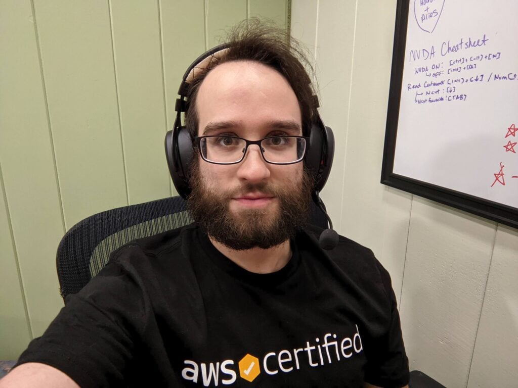 Aaron wearing an 'AWS Certified' tee shirt