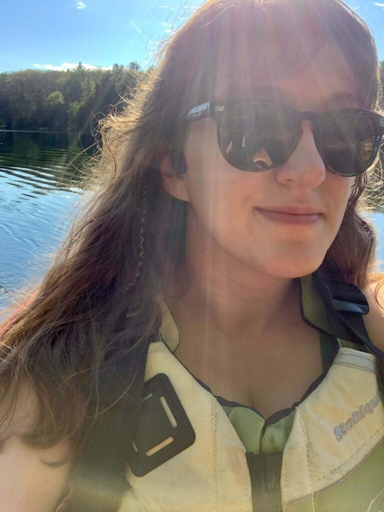 Photo of lauren kayaking