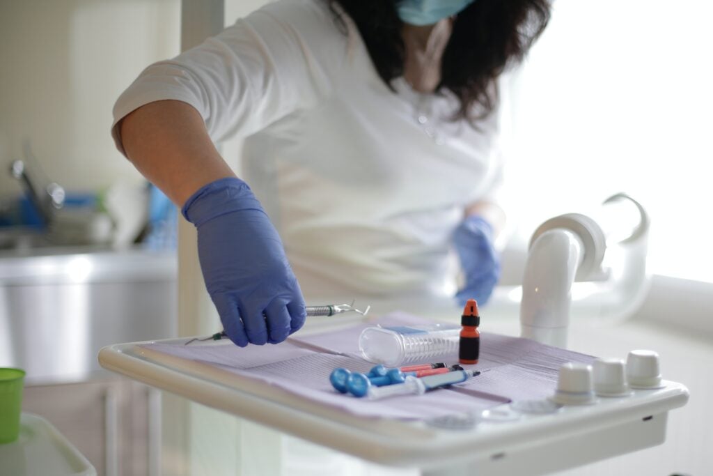 Dentist and dental tray with tools