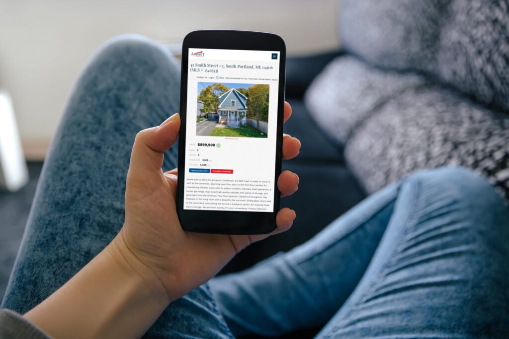 Amnet Realty homepage screenshot on a phone