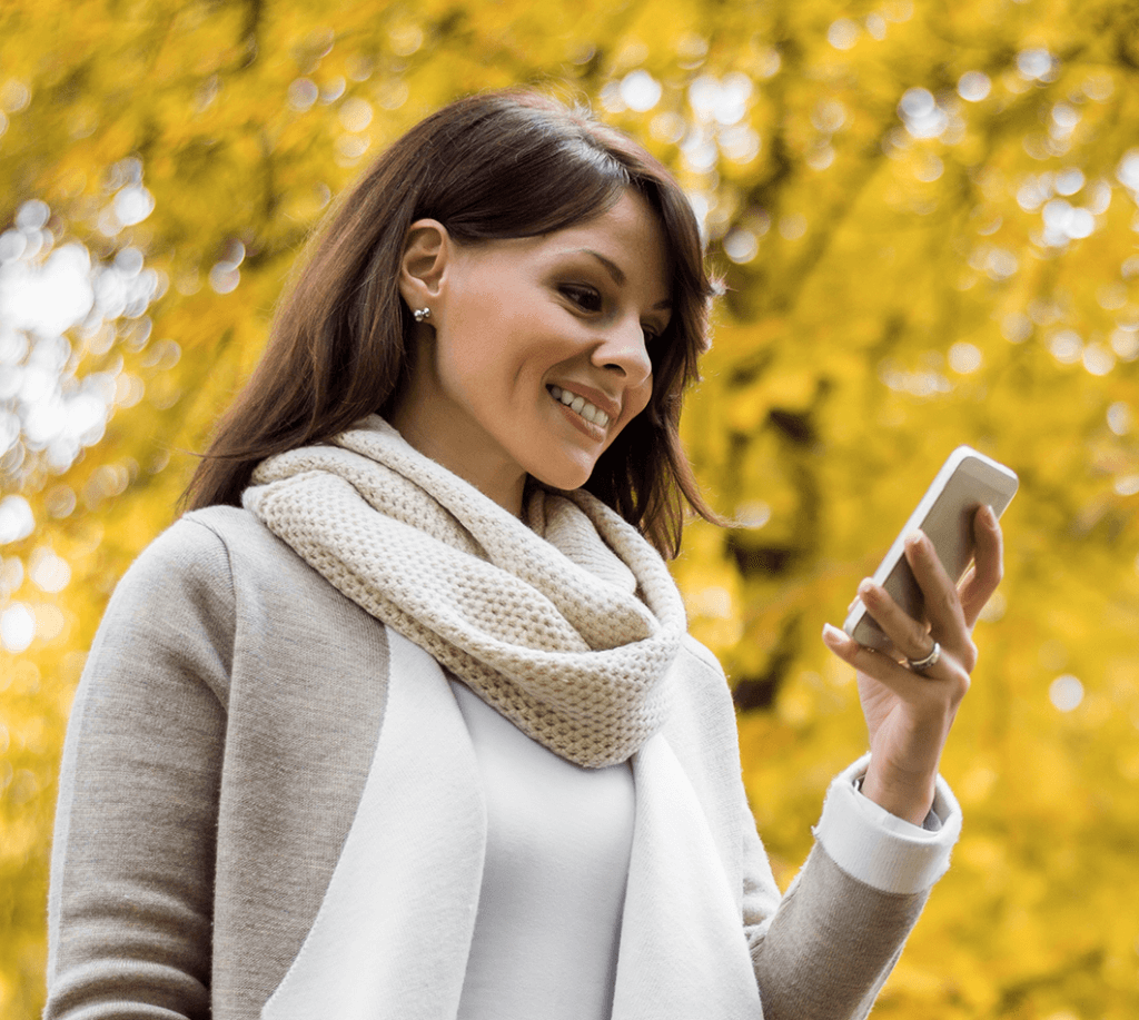 woman holding phone